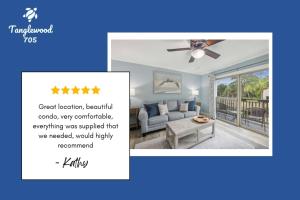 a living room with a couch and a ceiling fan at Forest Beach Villa - 2 BDR for 6 in Hilton Head Island