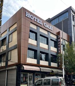 a hotel building with a hotel gas sign on it at Hotel Gazi in Gaziantep
