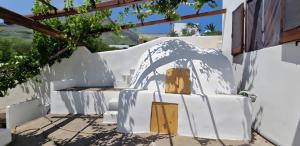 a room with a table and a mountain at Casa Marel in Stromboli