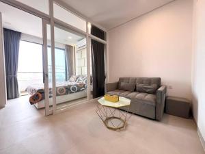 a living room with a couch and a bedroom at Jitendra Pyakuryal in Kathmandu
