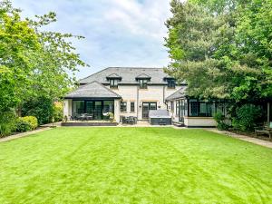 a house with a large lawn in front of it at Castlebar in Little Singleton +38 photos