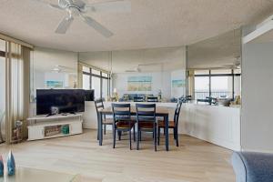 a kitchen and dining room with a table and chairs at Pyramid 6K in Ocean City +18 photos