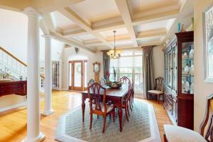 a dining room with a table and chairs at The Point 1437 in Ocean Pines +19 photos