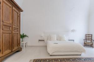 Cama o camas de una habitación en Palazzo Venusio