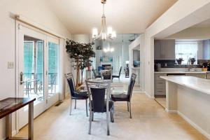 a kitchen and dining room with a table and chairs at 22 Harpoon rd in Ocean Pines +16 photos