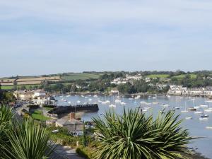 a view of a harbor with boats in the water at Tresidder Barn in Constantine