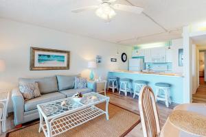 a living room with a couch and a table at Pyramid 9G in Ocean City