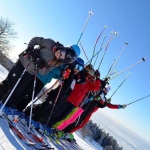 a group of people on skis in the snow at Le chalet des Etoiles in Lavans-Vuillafans +38 photos