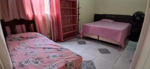 a room with two beds in a room with aermottermott at CasaLima in Bragança