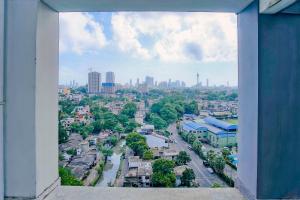 a view of a city from a window of a building at Lovish luxury villa in Colombo