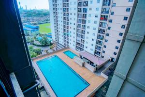 a swimming pool on the balcony of a building at Lovish luxury villa in Colombo