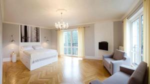 Postel nebo postele na pokoji v ubytování Spa Hotel Garni Löwenstein