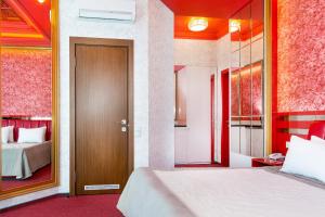 Postel nebo postele na pokoji v ubytování Road Star Hotel