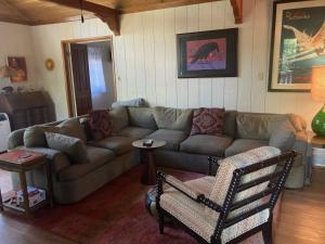 a living room with a couch and a chair at The Crow's Nest in Idyllwild