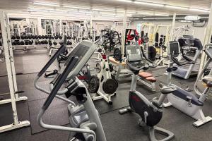 a gym filled with lots of tread machines at Gemütliches Apartment in Landeck in Landeck