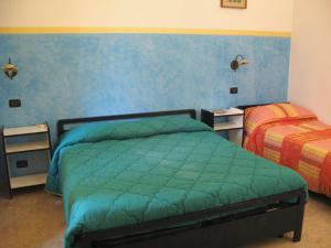 Voodi või voodid majutusasutuse Mare Blu toas