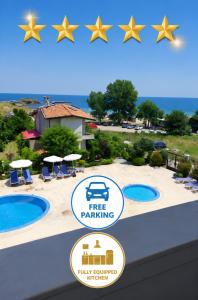 a view of a resort with three pools and five stars at SEA WOLF Apartman Луксозен апартамент с панорамна гледка към морето климатик с нова напълно оборудвана кухня отделна баня с тоалетна гледка към басейна на 30 м от плажа Паркинг към хотела Навсякъде близо in Lozenets