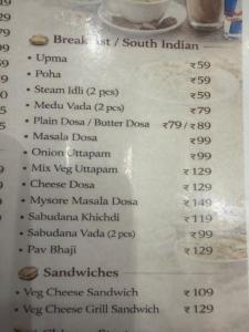 a picture of a menu for a restaurant at Hotel Krishna Leela Lodging and Boarding in Bhusāwal