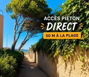 a sign that reads access prison direct m a la place next to a wall at Chez Juju - petit cocon face à la mer avec parking in Sète