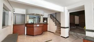 a hallway with a staircase in a house at new bv carlos paz in Villa Carlos Paz