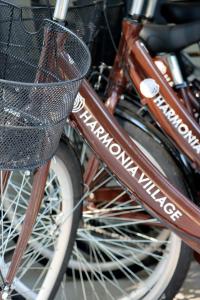 a bicycle with a basket with the words at Harmonia Village in Lido di Jesolo