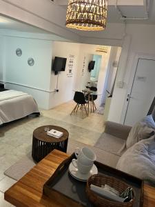 a living room with a couch and a table at Rubí Department in Santa Rosa