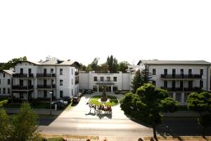 an aerial view of a city with buildings at Hotel Uzdrowiskowy St George in Ciechocinek