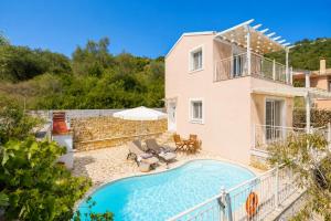 an image of a villa with a swimming pool at Villa Magda Dione in Gaios