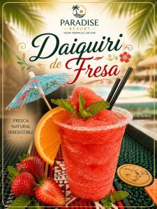 a book cover of a red drink with an orange slice at Paradise Resort in Los Santos