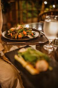 a plate of food on top of a table at El Remanso Rainforest Lodge in Puerto Jiménez +156 photos