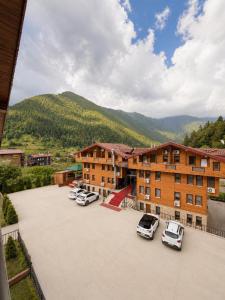 a group of cars parked in a parking lot at Ena Suites in Çaykara