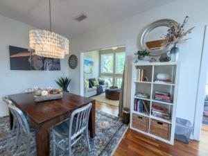 a dining room with a wooden table and chairs at 3017 Ocean Winds in Seabrook Island