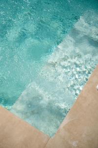 a close up of a pool of water at Villas Pasha in Faliraki