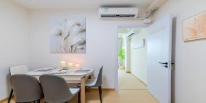 a dining room with a table and chairs at Uffice apartment in Shanghai