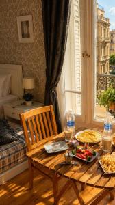 a wooden table with food on it in a room at new colmbia in Cairo