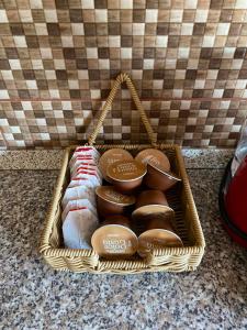 a basket filled with different types of chocolate at Purple Madame in Balatonszárszó