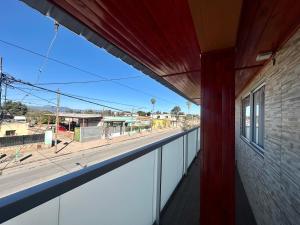 a balcony of a building with a view of a street at Jean Pierre in La Merced