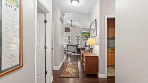 a hallway of a home with a living room at TeeTime Green On the Fairway in Camdenton