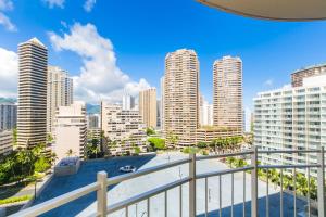 a view of a city skyline with tall buildings at Ilikai Marina 1495 in Honolulu +11 photos