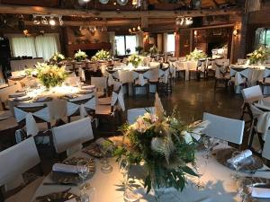 a banquet hall with white tables and white chairs at Pueblo Chico Agroturismo Hotel in La Floresta +65 photos
