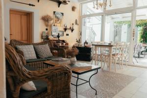a living room with a couch and a table at Casa Segota in Veli Iž +61 photos