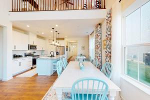 a kitchen and dining room with a table and chairs at Bishop's Landing -- 31186 VICTOR RD in Millville