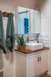 a bathroom with a sink and a mirror at The Heights in St Helens +45 photos