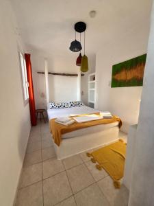 a bedroom with a bed in a room at 7olives Golden Boutique Apartment in Kastraki