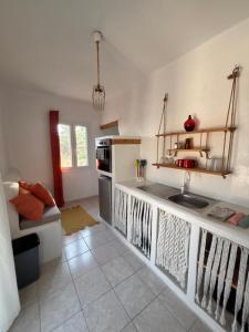 a kitchen with a sink and a counter top at 7olives Golden Boutique Apartment in Kastraki
