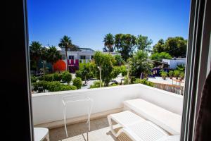 a balcony with a view of a city at The Village Resort By Acquaviva Gammarth in Gammarth