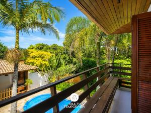 a view from the balcony of a villa at Bollté Praia Boutique Pousada - Campeche - Floripa - SC in Florianópolis