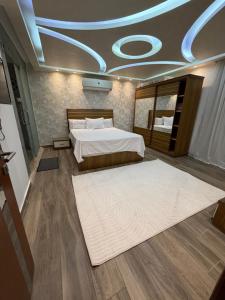 a bedroom with two beds and a domed ceiling at برج زيزينيا in Port Said
