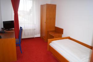 Postel nebo postele na pokoji v ubytování Hotel Rahlstedter Hof