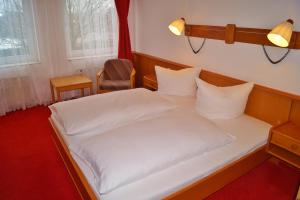Postel nebo postele na pokoji v ubytování Hotel Rahlstedter Hof